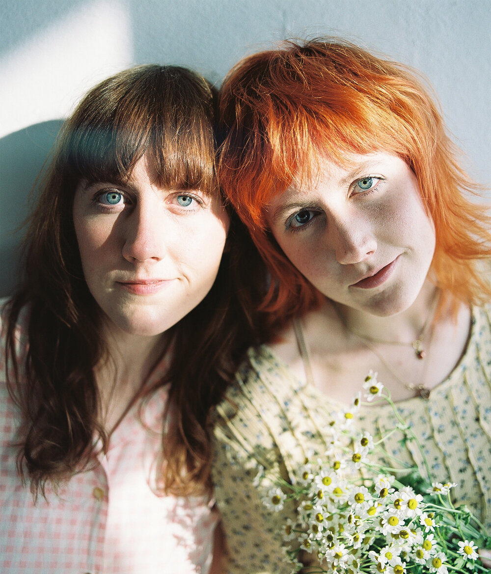 About - Identical twin sisters Jo and Sophia Babb bring wise, emotive lyrics and immaculate, perfectly-matched vocal harmonies to Annie Oakley.Writing about themes of new growth and the natural beauty around them, their music has received warm reception across the UK, Europe, and the US.Their new album, Second Day of Spring, will be released internationally in Spring 2021.
